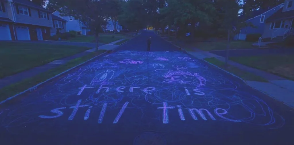 in chalk: &quot;there is still time&quot;